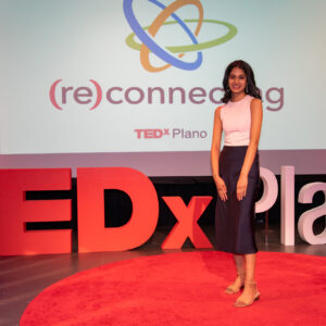 Akshaya Annampedu giving her TEDxPlano talk on "Opening Doors for Marginalized Student" Voices